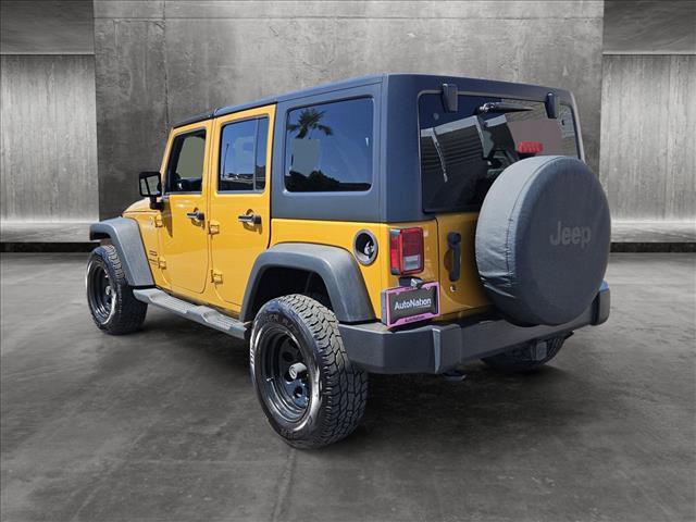 used 2014 Jeep Wrangler Unlimited car, priced at $19,455