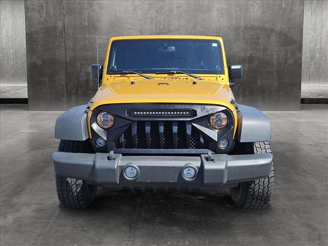 used 2014 Jeep Wrangler Unlimited car, priced at $19,455