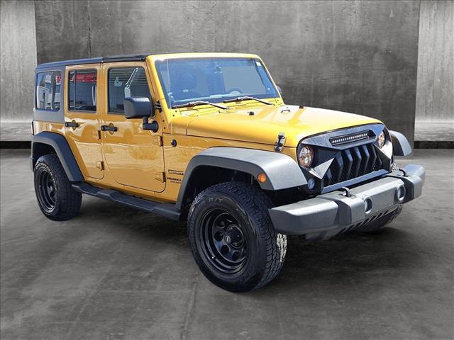 used 2014 Jeep Wrangler Unlimited car, priced at $19,455