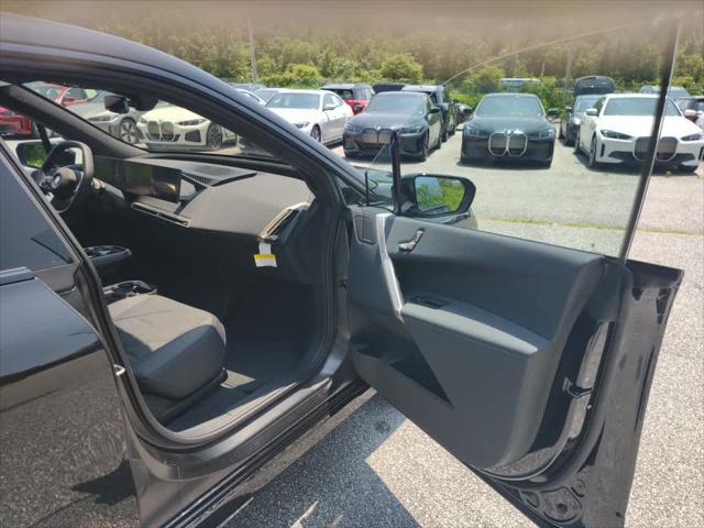 new 2026 BMW iX car, priced at $84,925