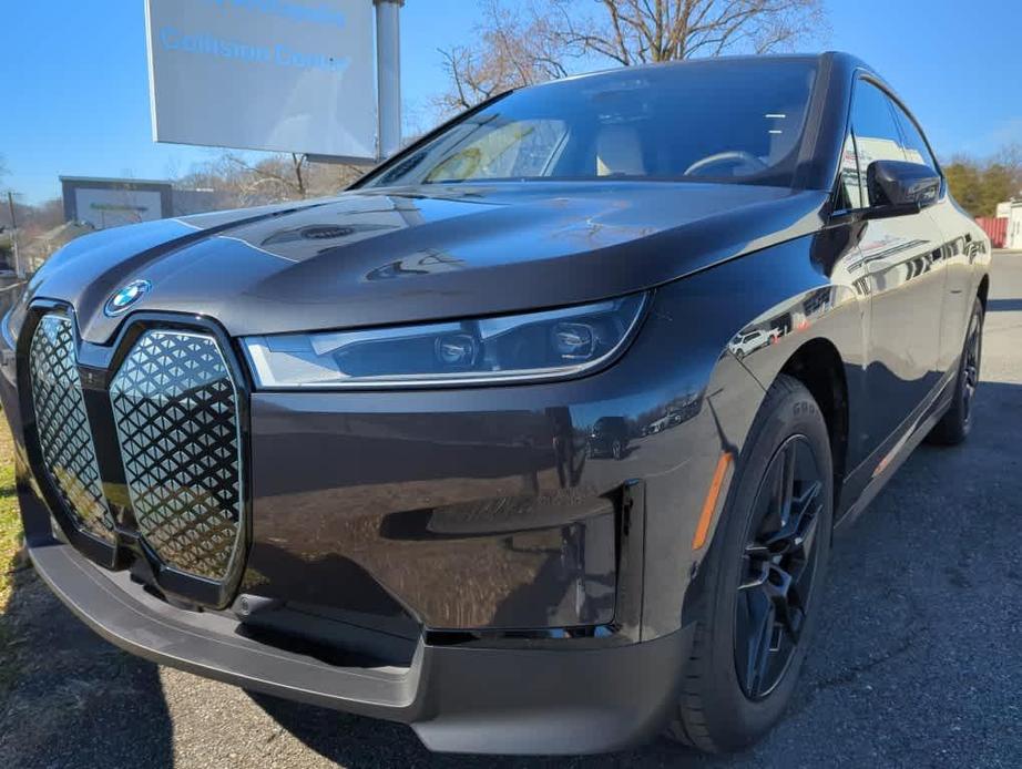 new 2024 BMW iX car, priced at $94,875