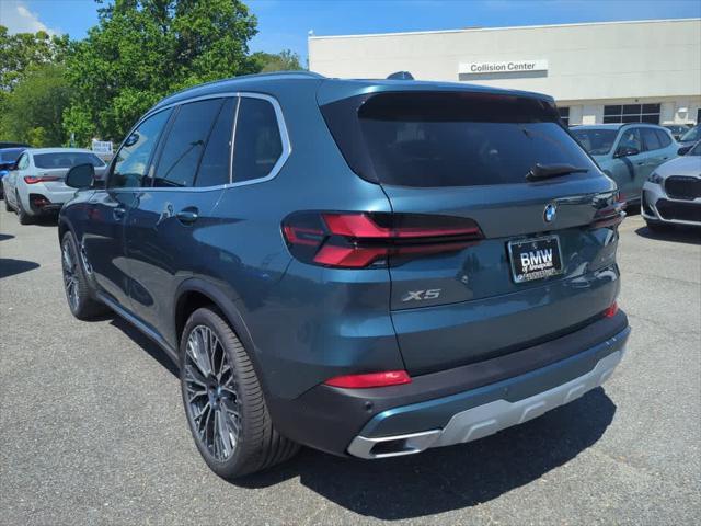 used 2025 BMW X5 car, priced at $73,911