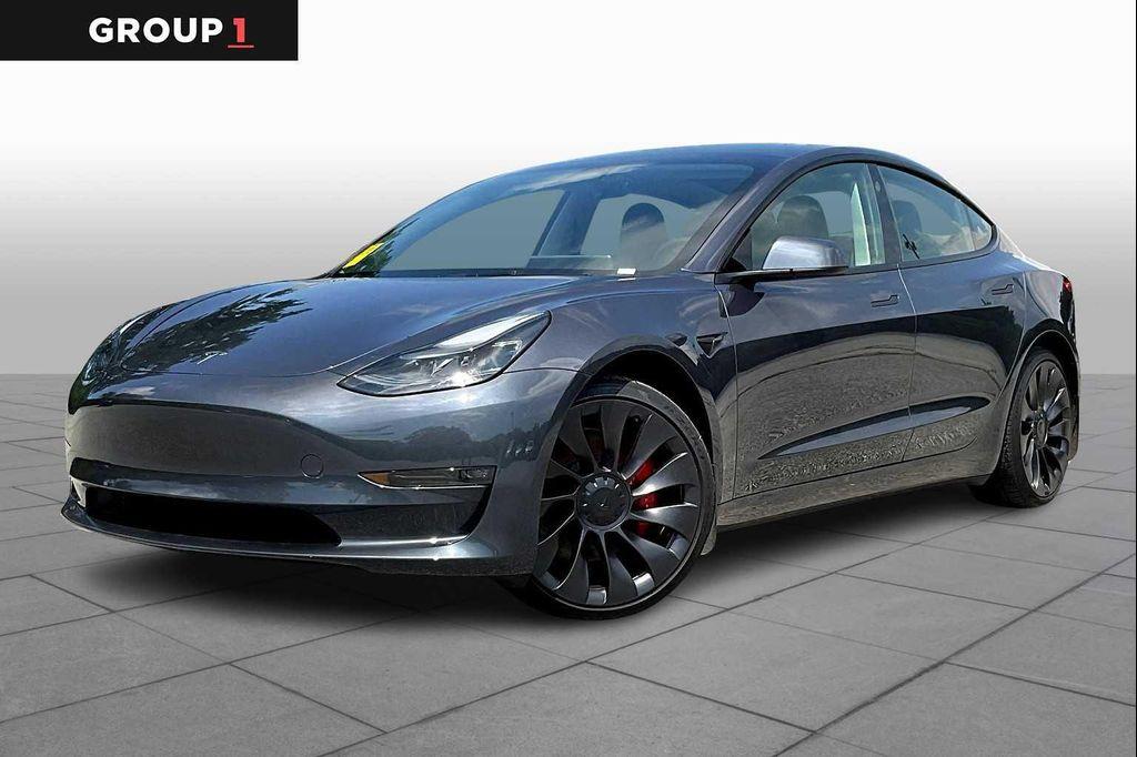 used 2023 Tesla Model 3 car, priced at $30,990