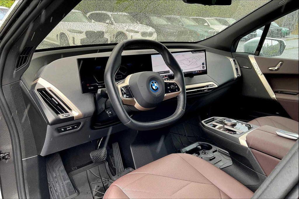 used 2024 BMW iX car, priced at $49,990