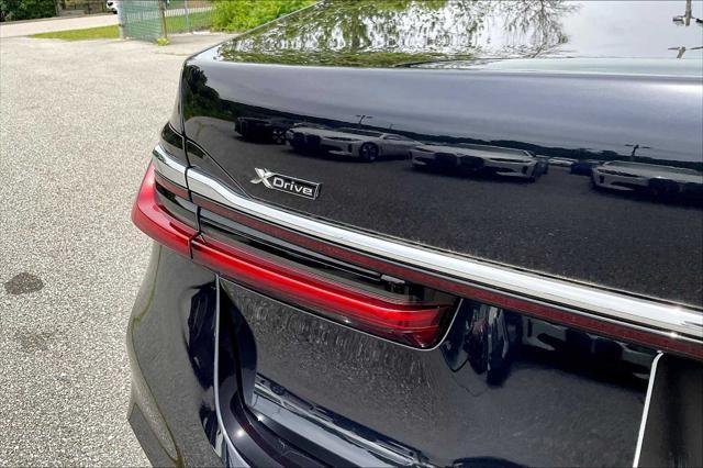 used 2022 BMW 750 car, priced at $60,990