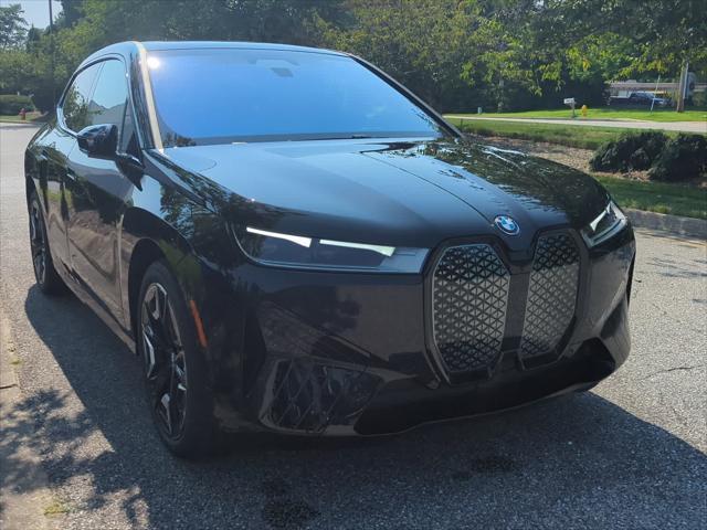 new 2025 BMW iX car, priced at $100,325