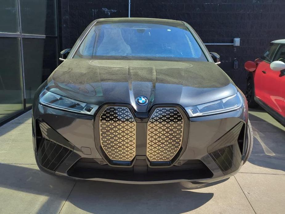 new 2024 BMW iX car, priced at $122,055