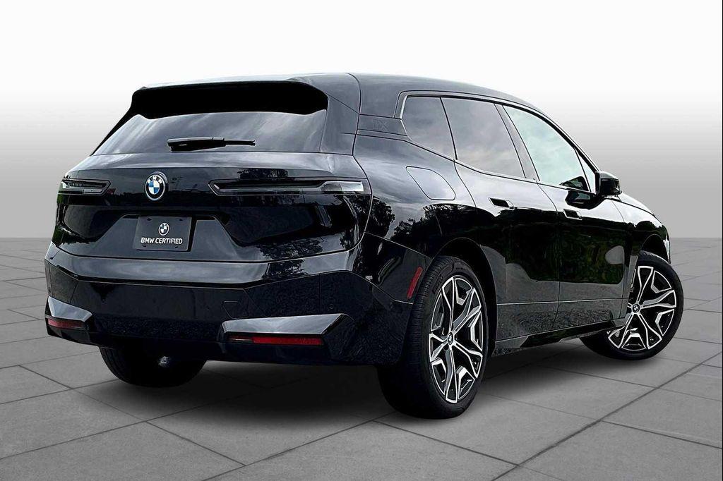 used 2025 BMW iX car, priced at $59,900