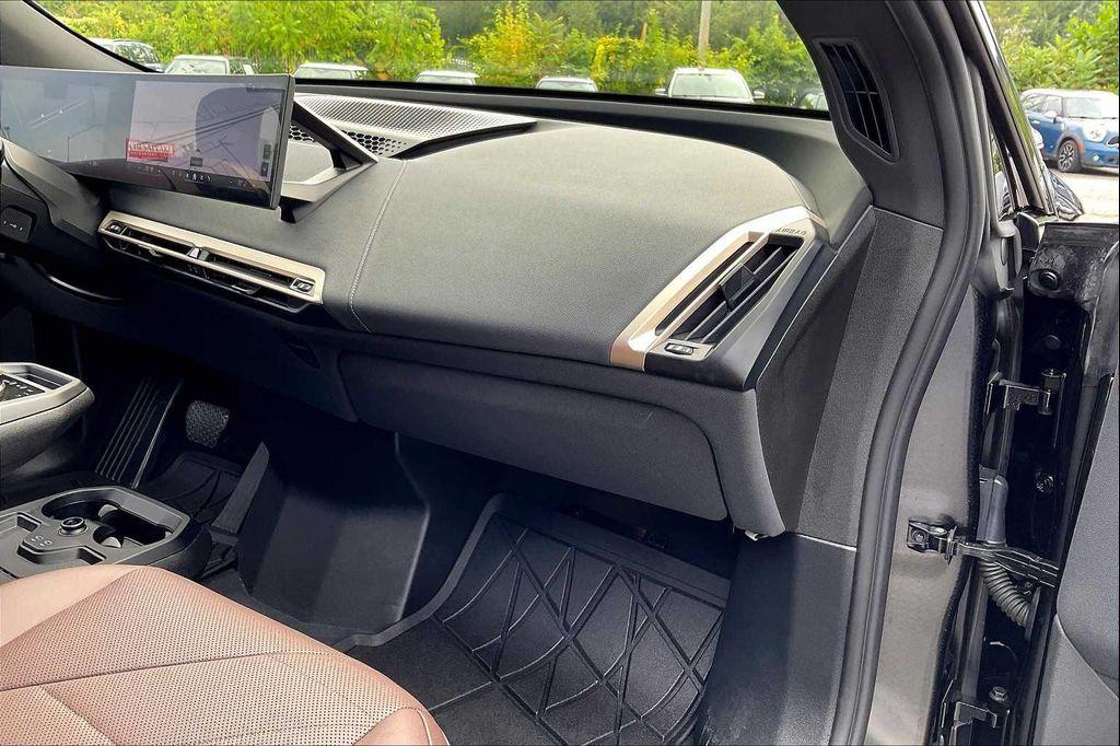 used 2025 BMW iX car, priced at $59,900