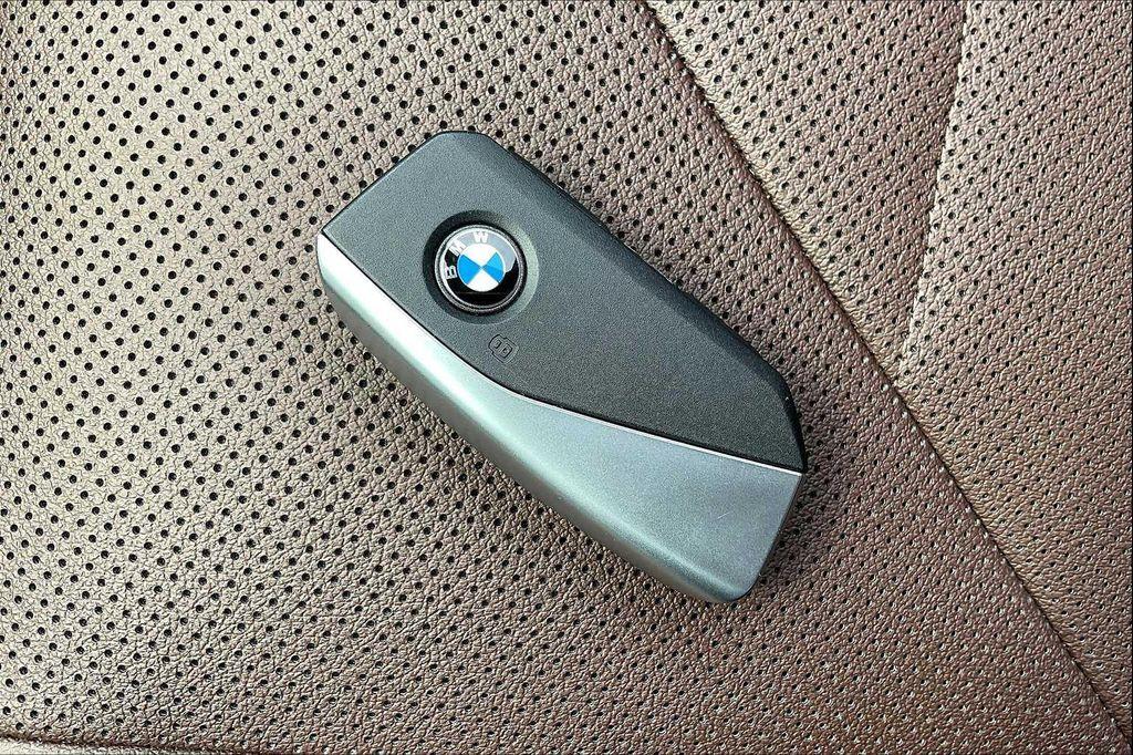 used 2025 BMW iX car, priced at $59,900