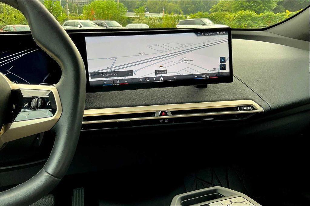 used 2025 BMW iX car, priced at $59,900