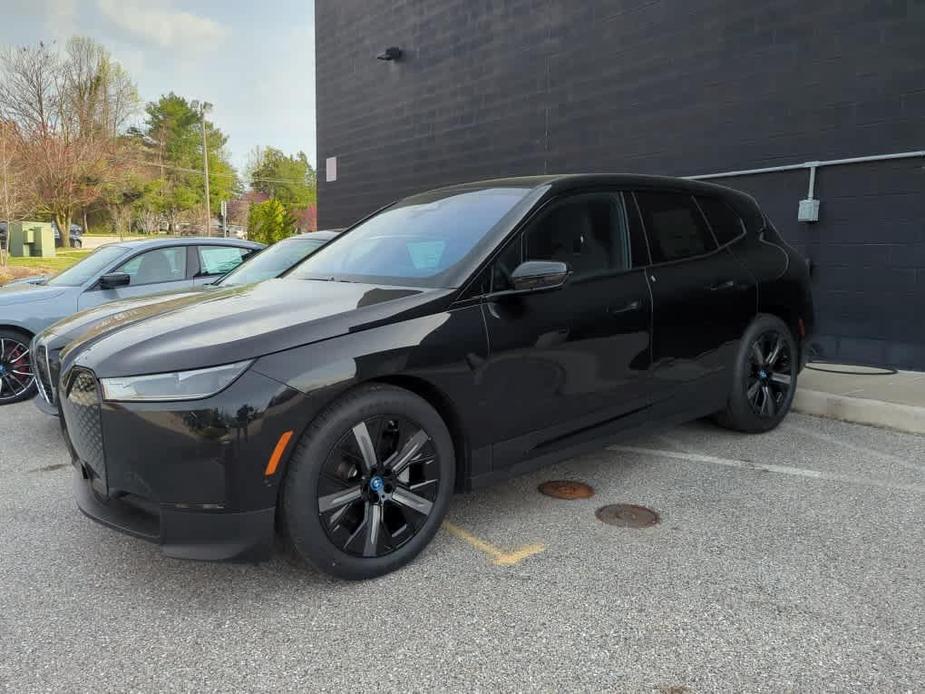 new 2024 BMW iX car, priced at $94,075