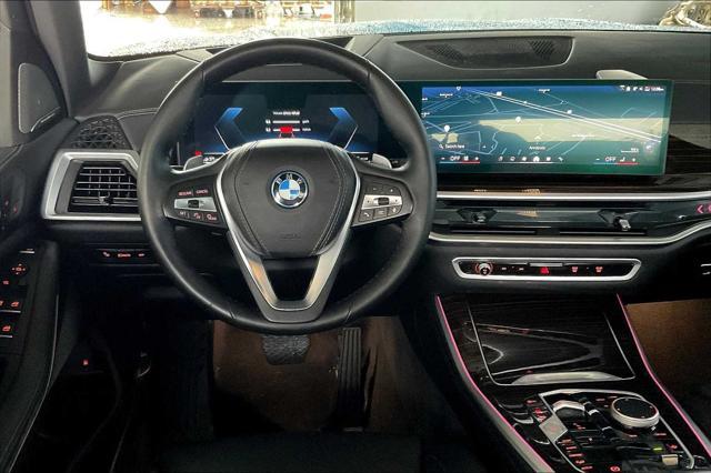 used 2025 BMW X5 PHEV car, priced at $64,900