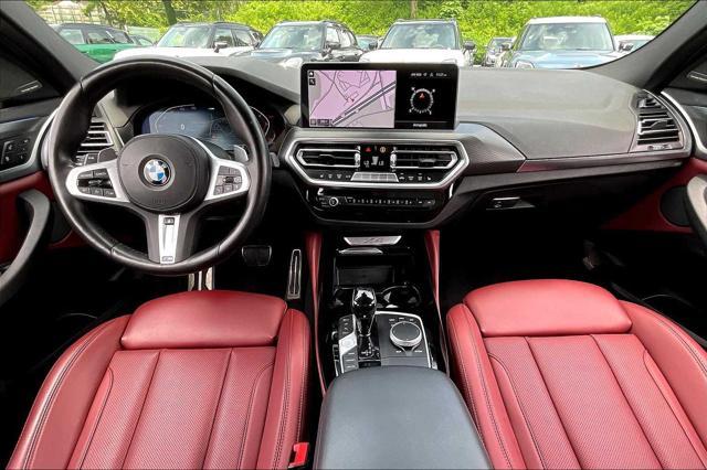 used 2023 BMW X4 car, priced at $41,900