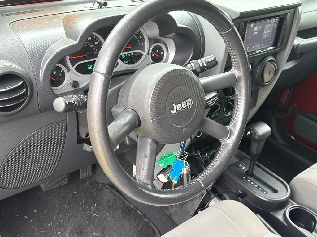 used 2010 Jeep Wrangler Unlimited car, priced at $13,699