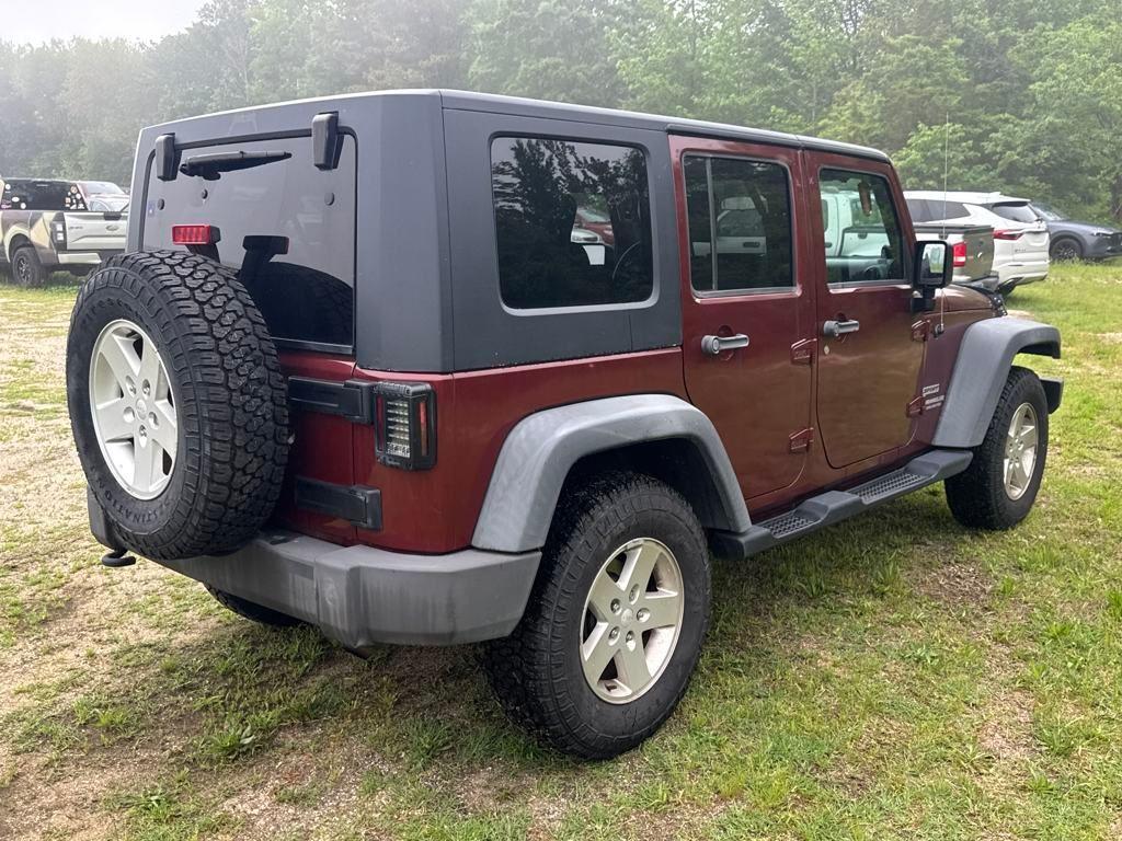 used 2010 Jeep Wrangler Unlimited car, priced at $13,699