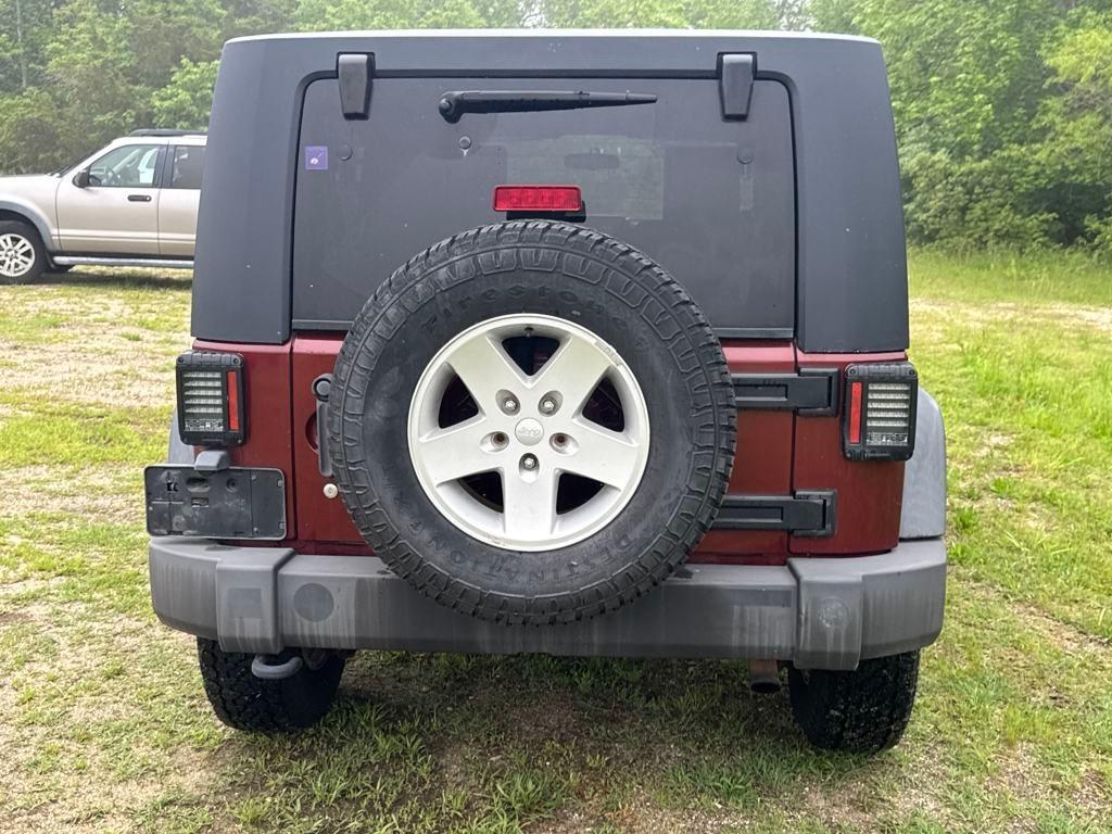 used 2010 Jeep Wrangler Unlimited car, priced at $13,699