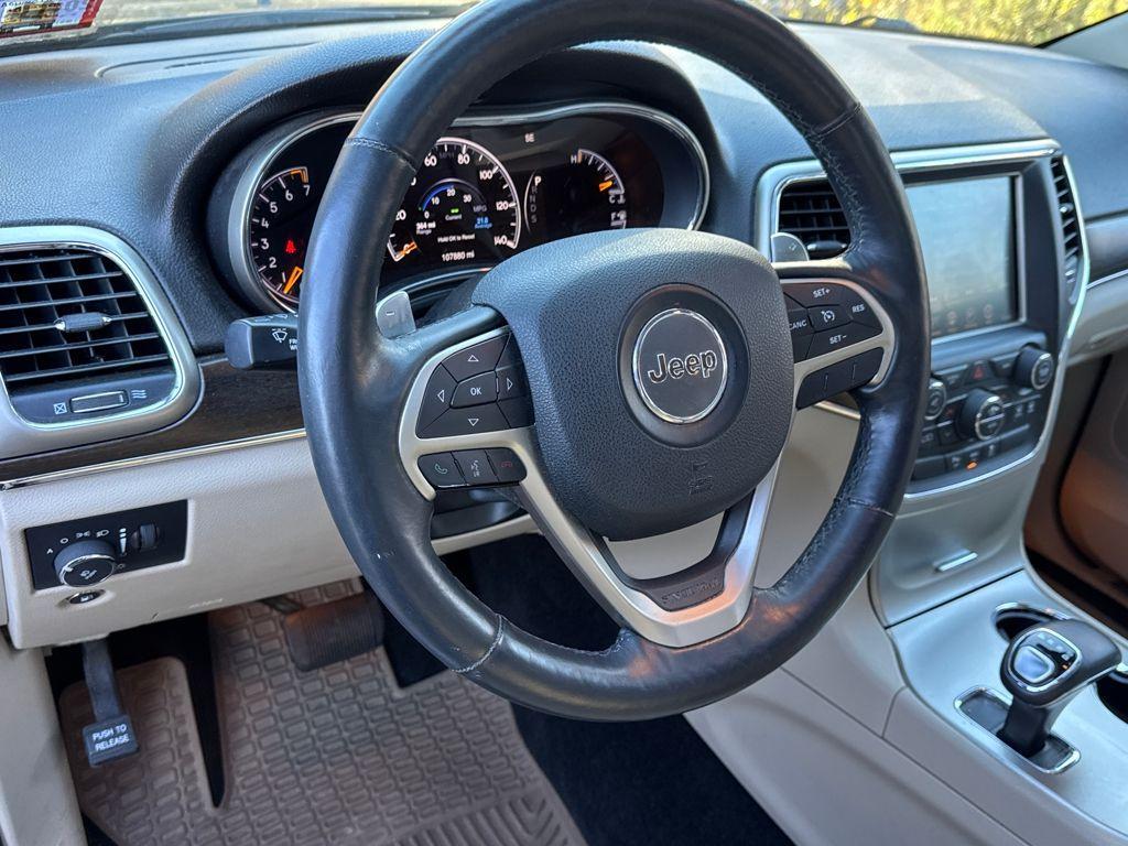 used 2014 Jeep Grand Cherokee car, priced at $12,699