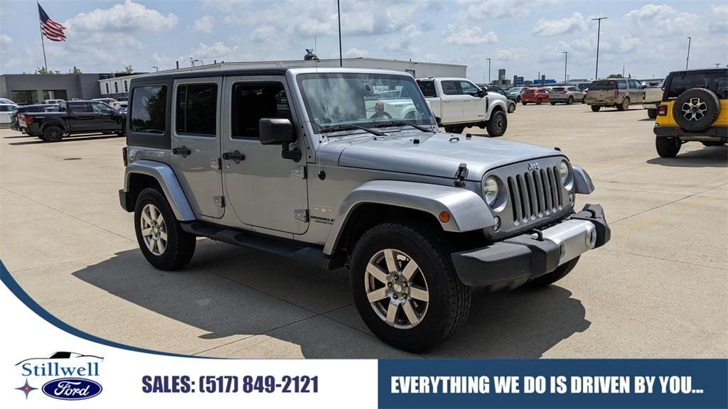 used 2014 Jeep Wrangler Unlimited car, priced at $14,830