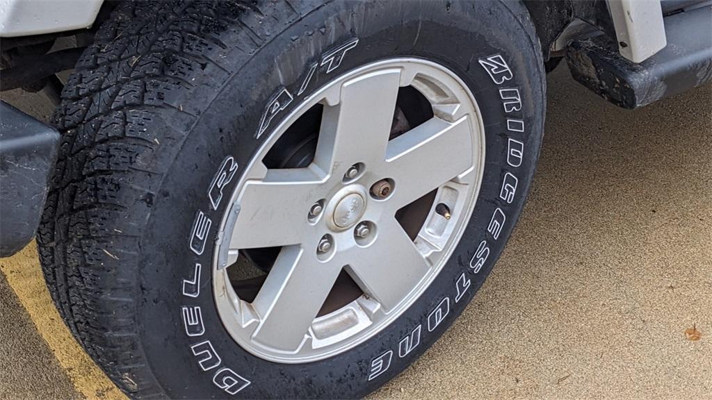 used 2012 Jeep Wrangler Unlimited car, priced at $15,612