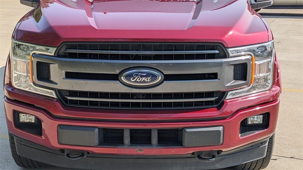 used 2018 Ford F-150 car, priced at $17,031