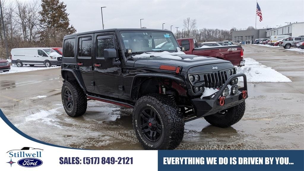 used 2014 Jeep Wrangler Unlimited car, priced at $15,265