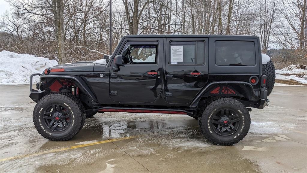used 2014 Jeep Wrangler Unlimited car, priced at $15,265
