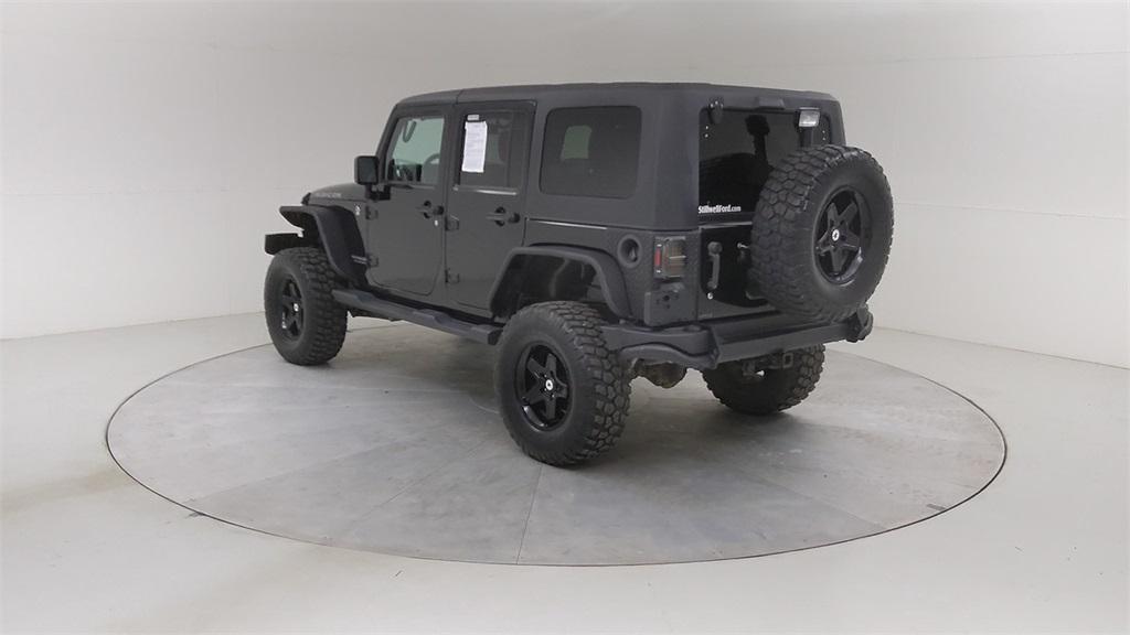 used 2014 Jeep Wrangler Unlimited car, priced at $19,280