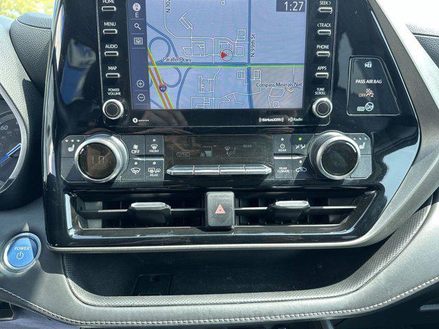 used 2021 Toyota Highlander Hybrid car, priced at $25,000