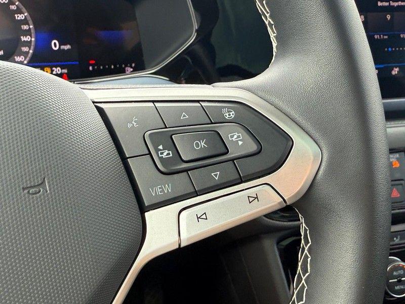 used 2024 Volkswagen Taos car, priced at $24,995