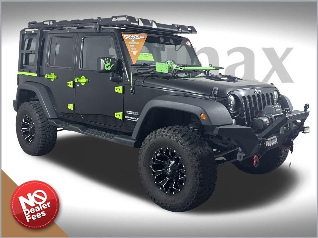 used 2014 Jeep Wrangler Unlimited car, priced at $15,901