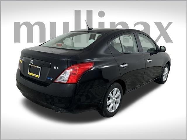 used 2012 Nissan Versa car, priced at $5,750