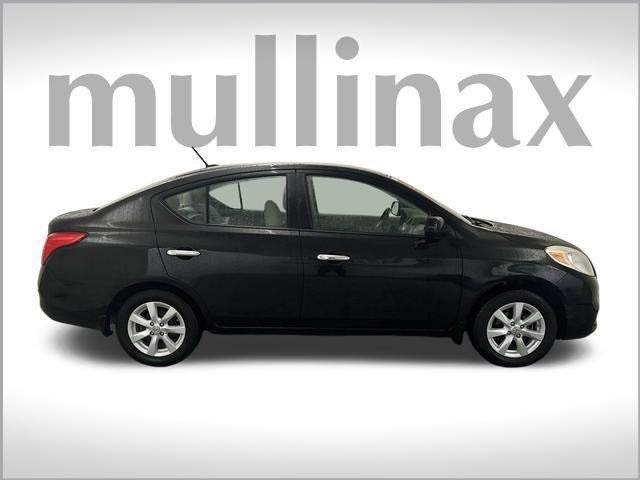 used 2012 Nissan Versa car, priced at $7,000