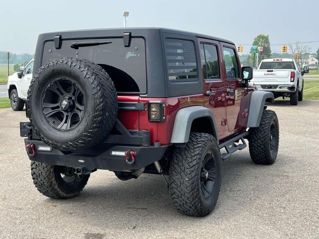 used 2013 Jeep Wrangler Unlimited car, priced at $12,995