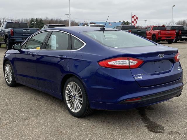 used 2016 Ford Fusion car, priced at $4,995