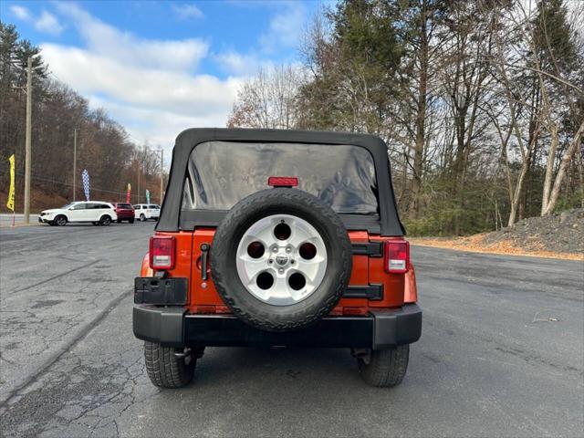 used 2014 Jeep Wrangler Unlimited car, priced at $20,900