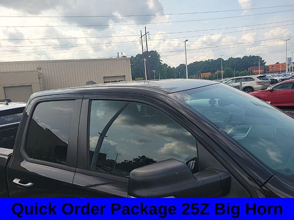 used 2021 Ram 1500 car, priced at $28,578