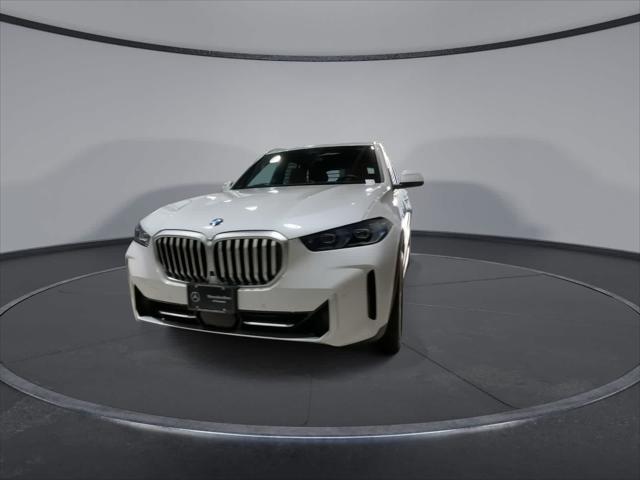 used 2024 BMW X5 car, priced at $62,087