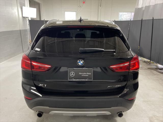 used 2018 BMW X1 car, priced at $16,098