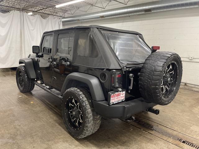 used 2014 Jeep Wrangler Unlimited car, priced at $17,949