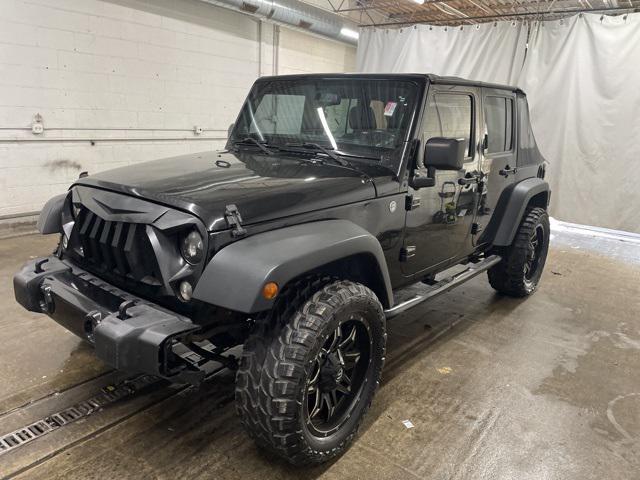 used 2014 Jeep Wrangler Unlimited car, priced at $17,949