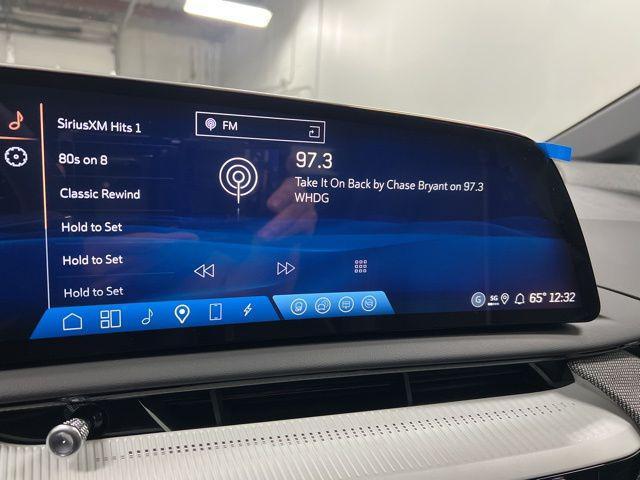 new 2025 Cadillac OPTIQ car, priced at $60,784