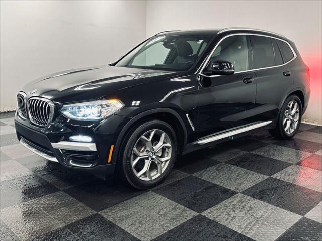 used 2021 BMW X3 PHEV car, priced at $37,223