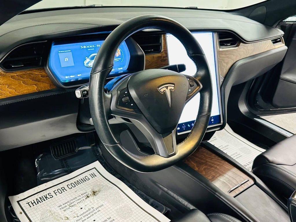 used 2020 Tesla Model S car, priced at $27,131