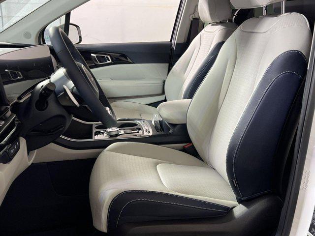 new 2025 Kia Carnival Hybrid car, priced at $56,855