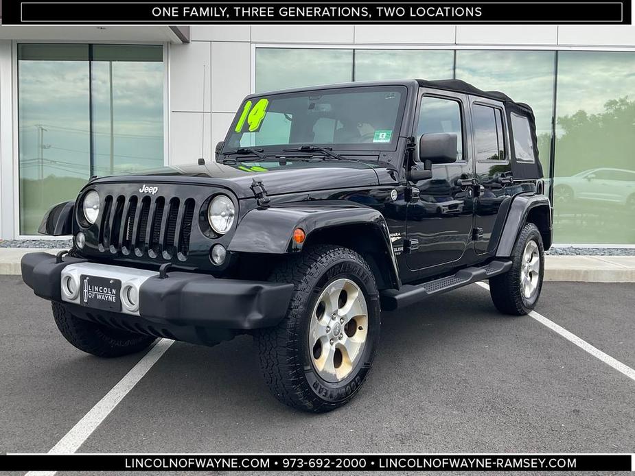 used 2014 Jeep Wrangler Unlimited car, priced at $16,994