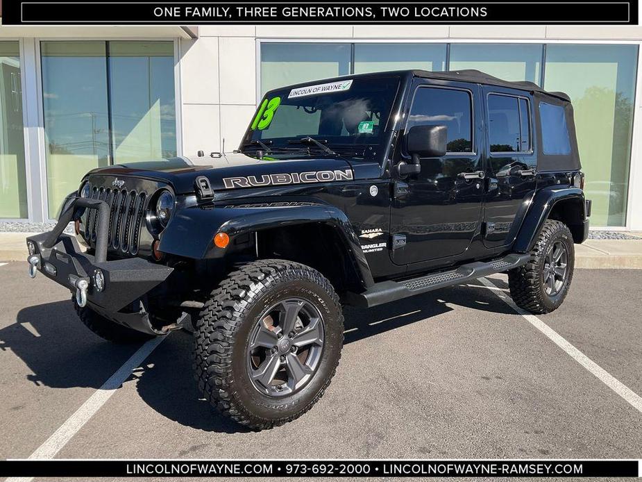 used 2013 Jeep Wrangler Unlimited car, priced at $13,494