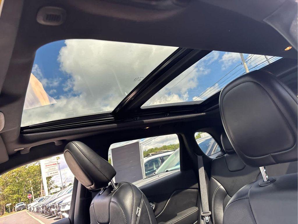 used 2021 Jeep Cherokee car, priced at $23,433