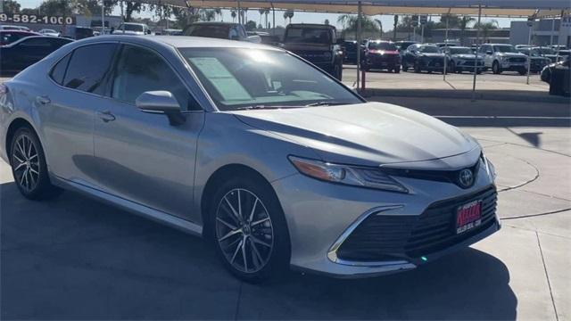 used 2023 Toyota Camry Hybrid car, priced at $32,376