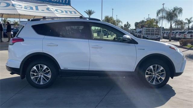 used 2018 Toyota RAV4 Hybrid car, priced at $22,590